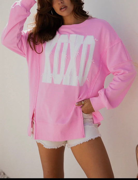 Pink Bow Sequin XOXO Letter Graphic Expose Seam Sweater