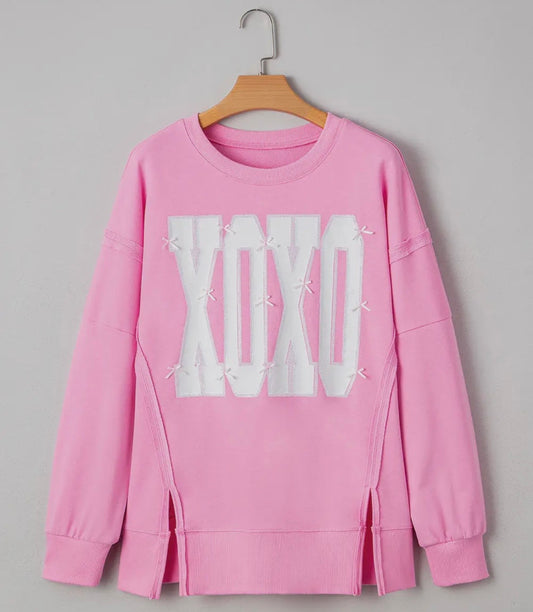 Pink Bow Sequin XOXO Letter Graphic Expose Seam Sweater