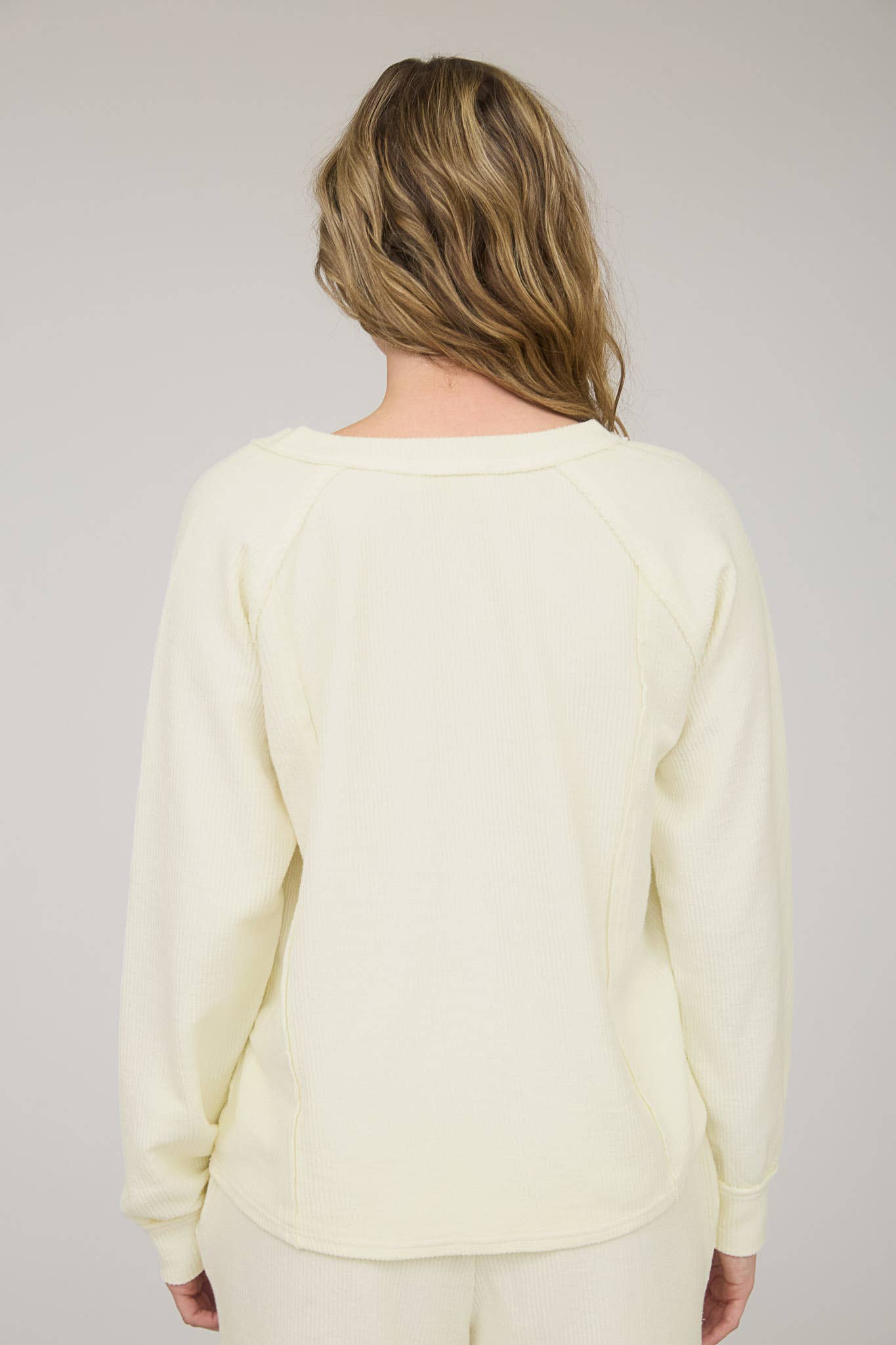 WASHED RIBBED SPLIT NECK LONG SLEEVE KNIT TOP